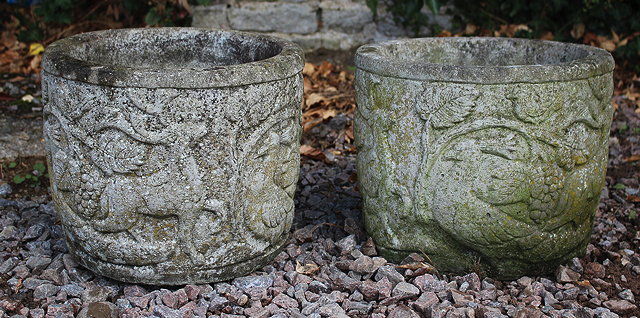 Appraisal: A PAIR OF CAST CONCRETE CYLINDRICAL GARDEN URNS cast with