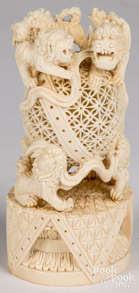 Appraisal: Chinese antique carved ivory foo dogs Chinese antique carved ivory