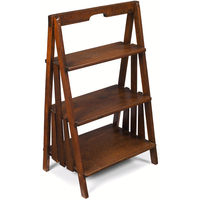 Appraisal: Arts and Crafts magazine stand three shelves supported by splayed