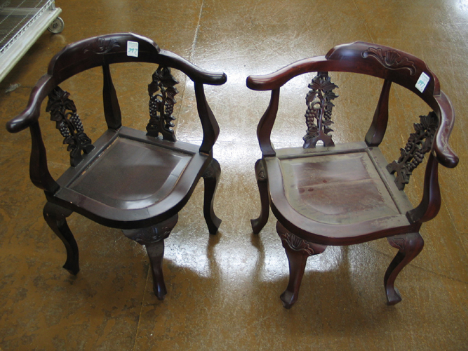 Appraisal: PAIR OF CHINESE CORNER ARMCHAIRS with matching horseshoe-shaped arms over