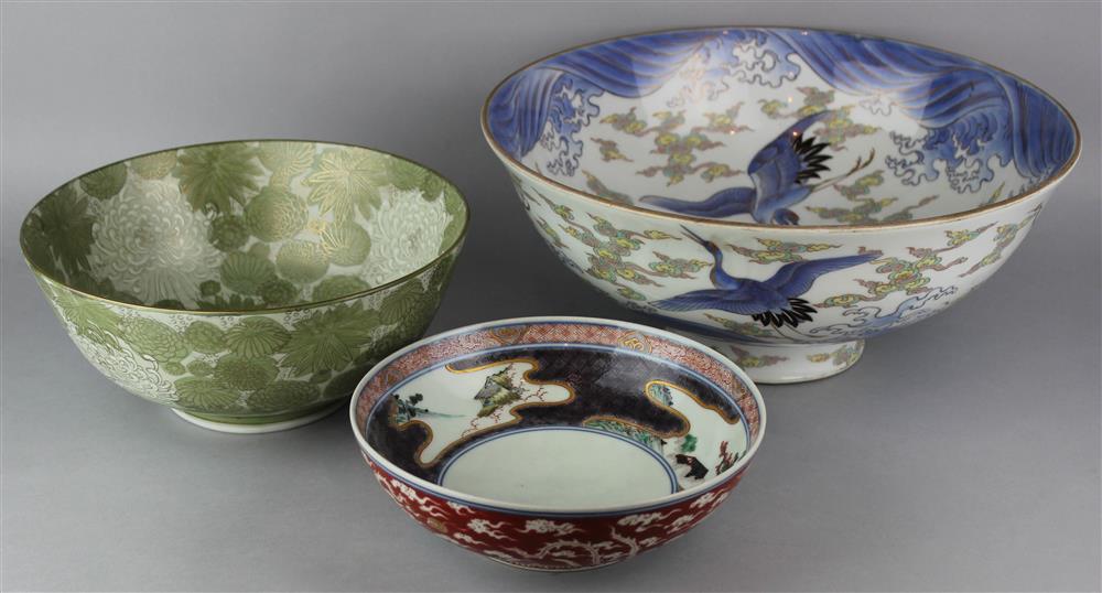 Appraisal: THREE JAPANESE LARGE BOWLS the first painted green cream gilt