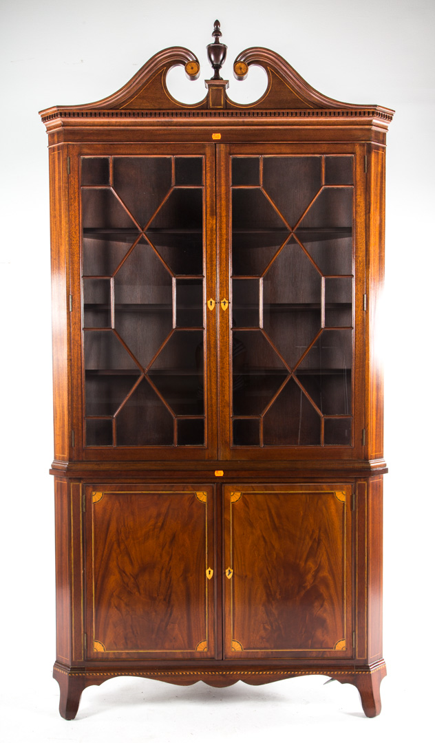 Appraisal: Potthast Federal style mahogany corner cupboard broken arched pediment with