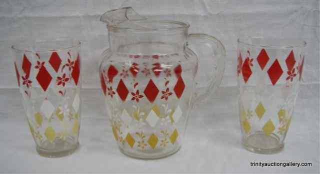 Appraisal: c 's Retro oz Ice Tea Pitcher Glass SetProduced by