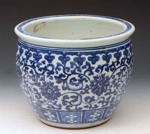 Appraisal: A CHINESE PORCELAIN BLUE AND WHITE JARDINIERE with foliate scroll