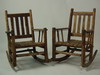 Appraisal: PORCH ROCKERS - Pair of rustic Adirondack style porch rockers