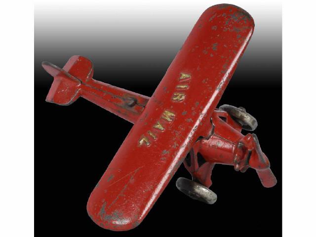 Appraisal: Small Red Cast Iron Kenton Airplane Toy Description Marked Air