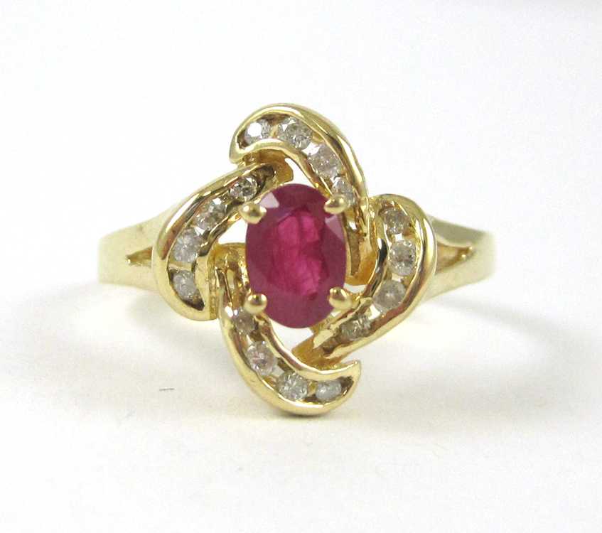 Appraisal: RUBY DIAMOND AND FOURTEEN KARAT GOLD RING with round-cut diamonds