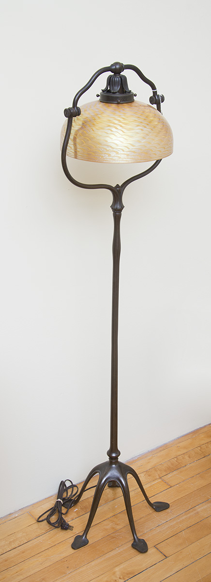 Appraisal: TIFFANY BONZE FLOOR LAMP WITH FAVRILE GLASS SHADE The bronze