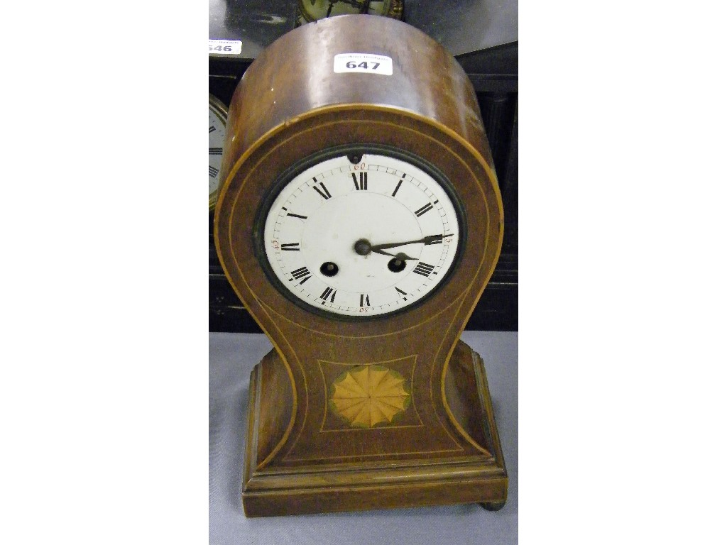 Appraisal: Mahogany two train balloon mantel clock the movement striking on