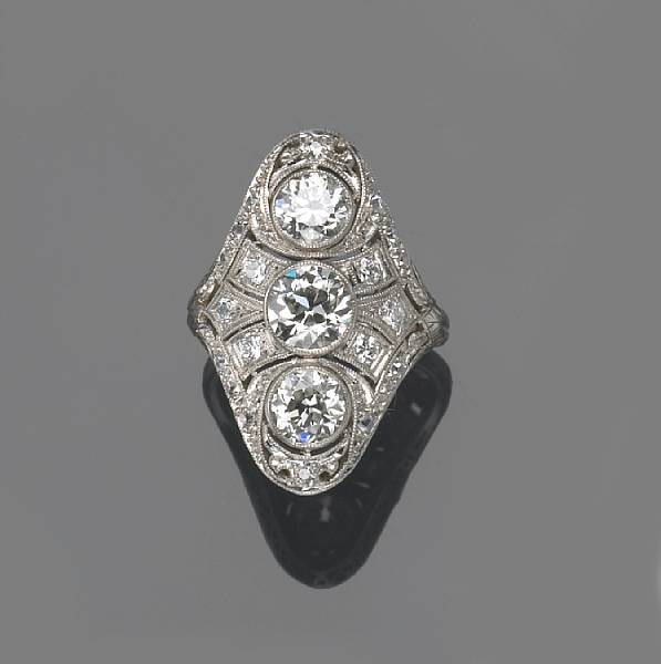 Appraisal: A diamond and platinum filigree ring estimated total diamond weight