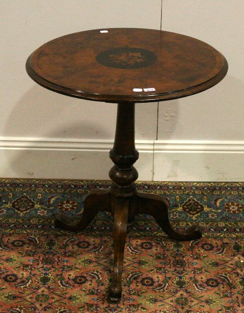 Appraisal: A circular topped pedestal wine table in walnut marquetry cm