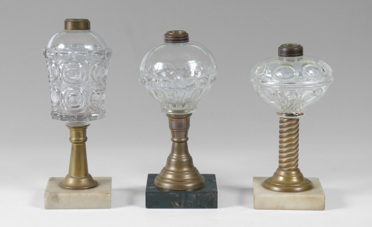 Appraisal: EARLY FLUID LAMPS Each with marble base Largest '' h