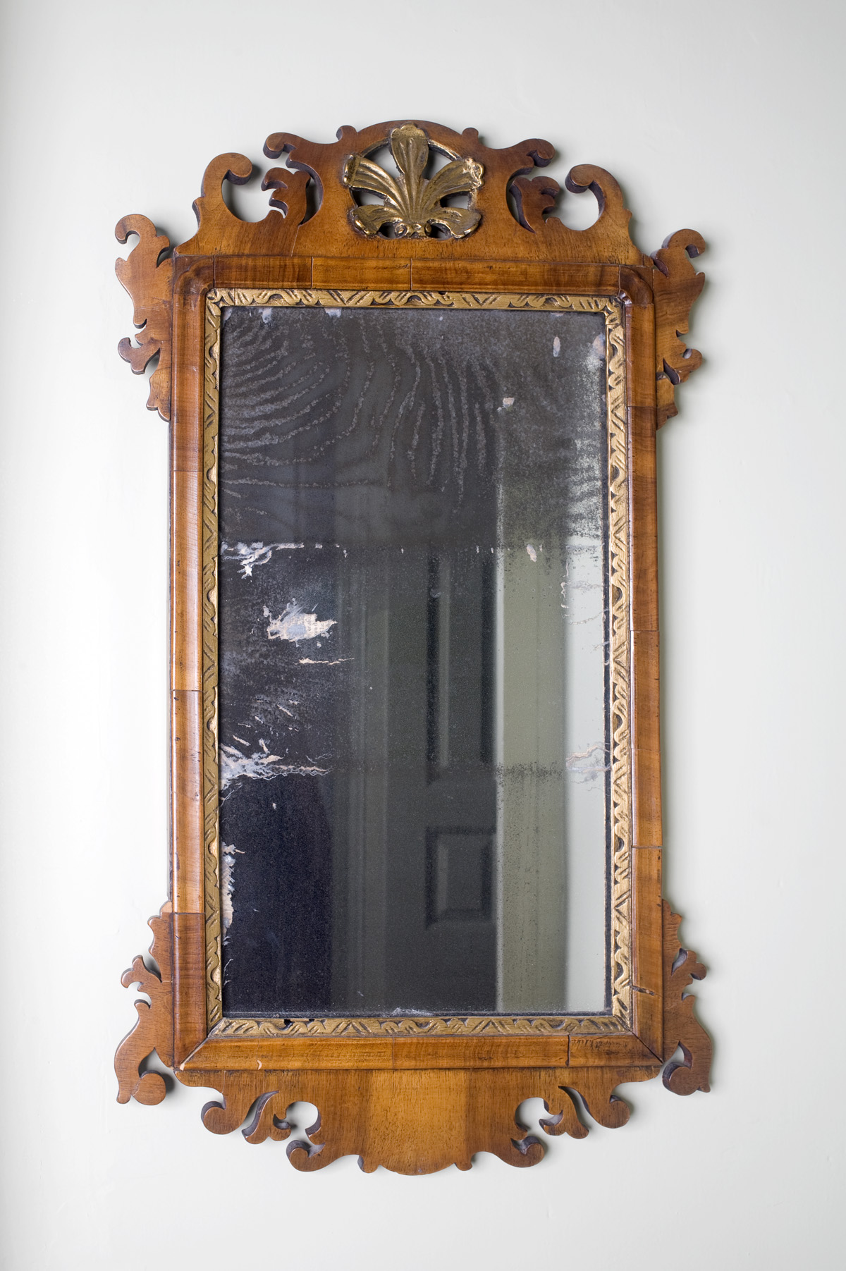 Appraisal: PAIR OF CHIPPENDALE STYLE MAHOGANY AND PARCEL-GILT MIRRORS Overall height