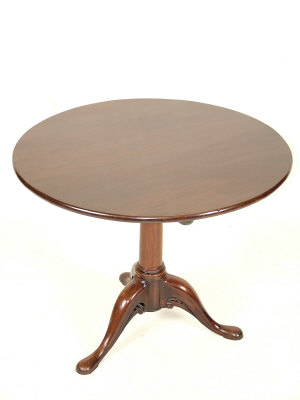 Appraisal: A George III mahogany tripod table circa the circular top