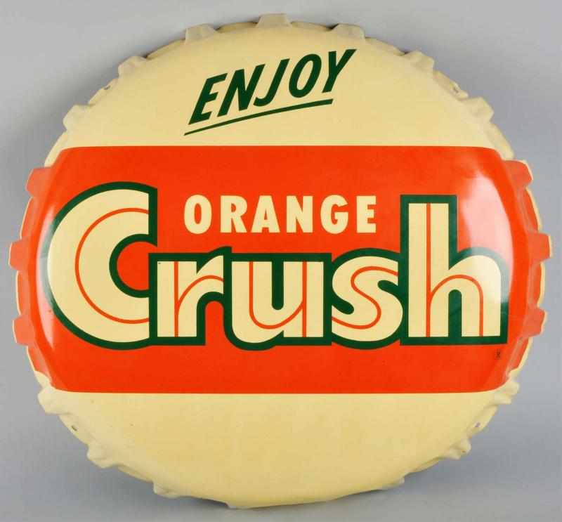 Appraisal: Embossed Tin Orange Crush Bottle Cap Sign Description s Extra-large