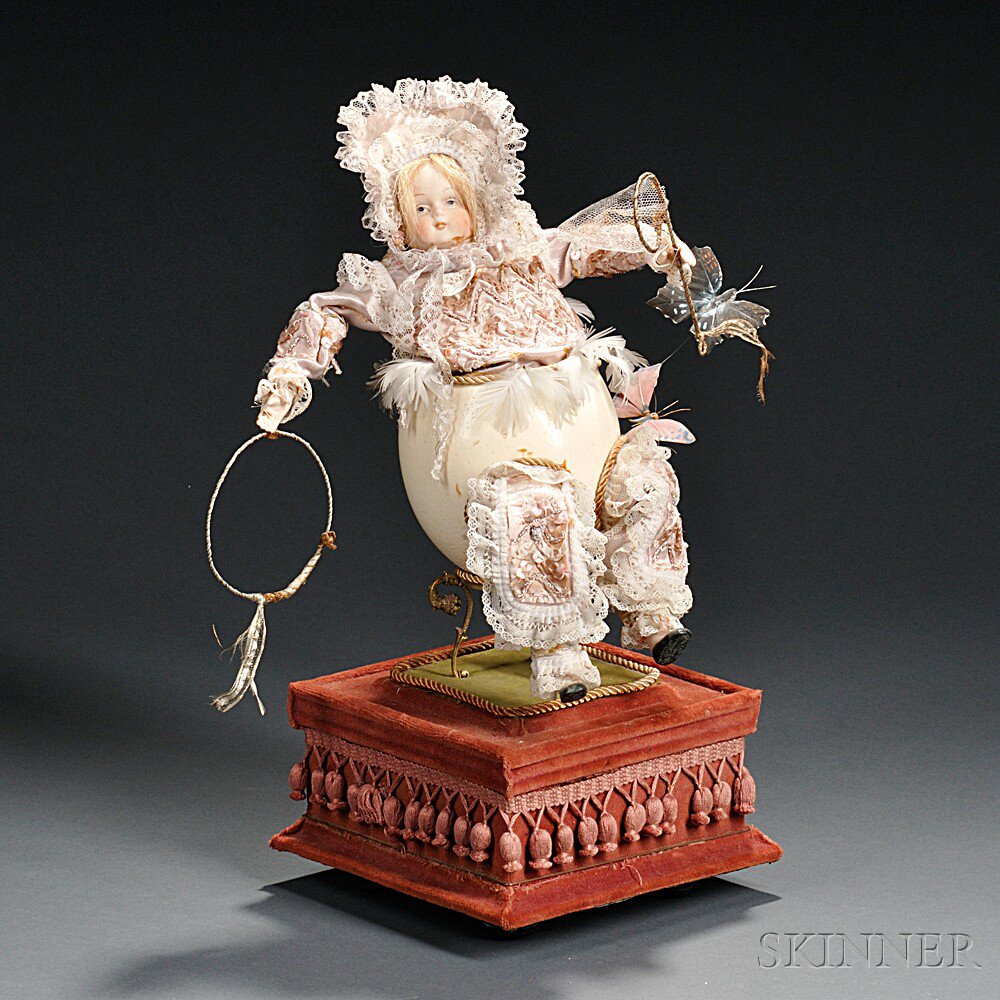 Appraisal: Musical Automaton Baby Doll Egg R Aldridge France the composite