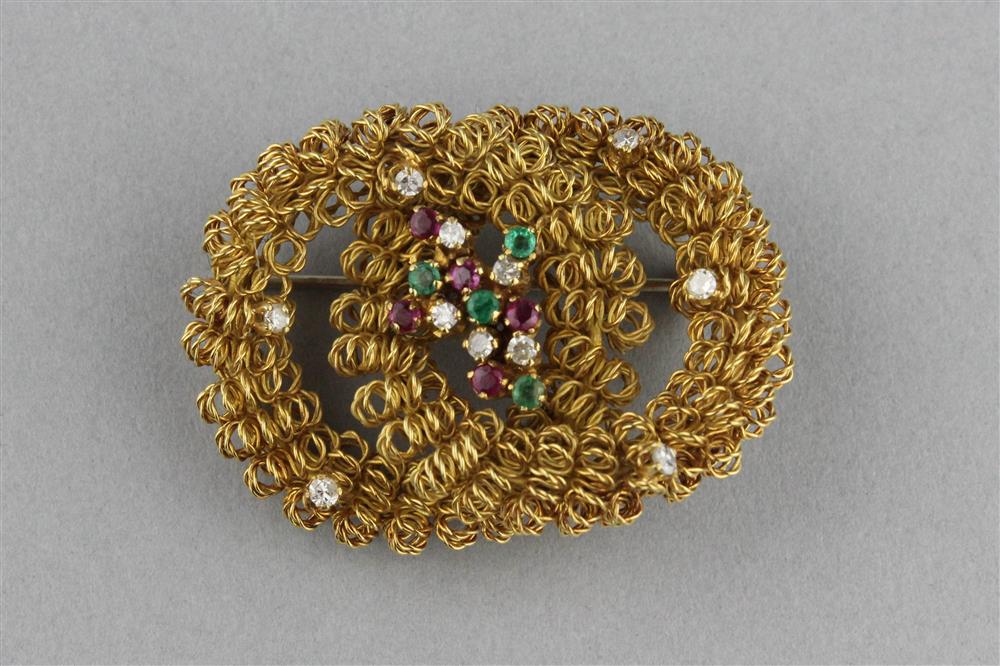 Appraisal: ITALIAN K YELLOW GOLD BROOCH WITH DIAMONDS EMERALDS AND RUBIES