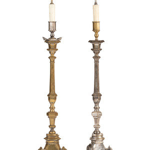 Appraisal: A Pair of Continental Baroque Style Silvered Brass Floor Candlestands