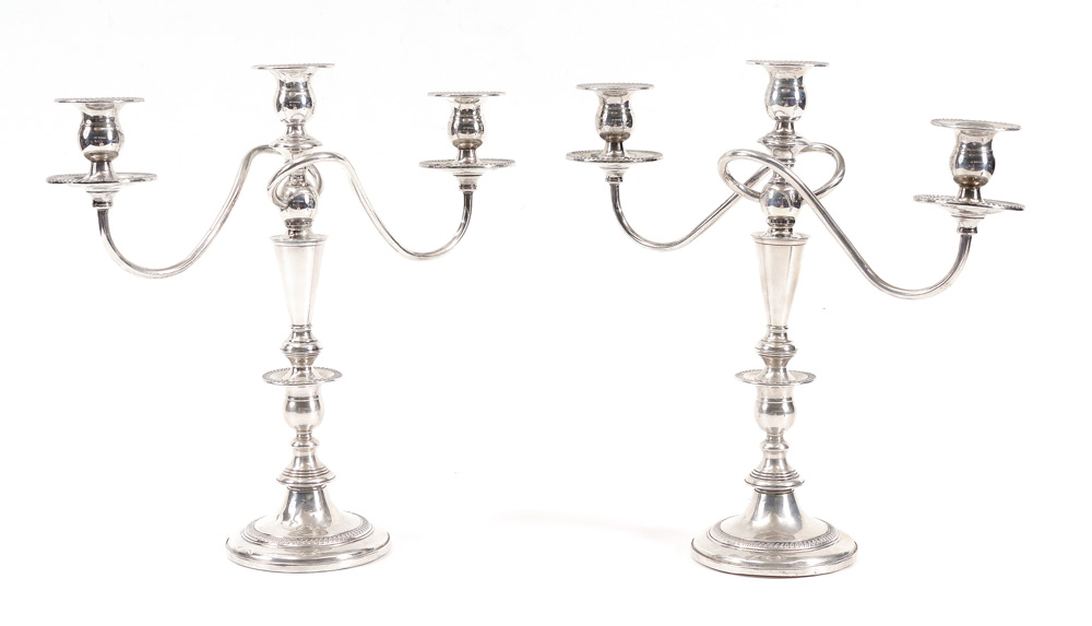 Appraisal: PAIR FISHER LIGHT STERLING CANDELABRA Weighted sterling convertible to single