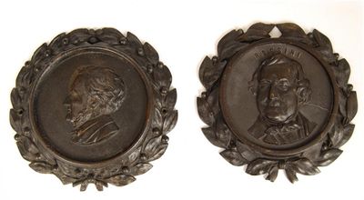 Appraisal: A bois durci portrait medallion Rossini with a laurel wreath