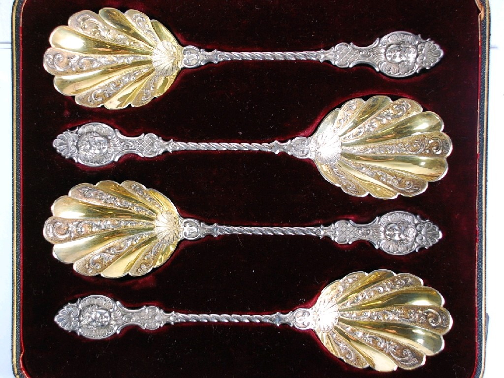 Appraisal: GOOD BOXED SET OF FOUR LATE VICTORIAN SERVING SPOONS rococo