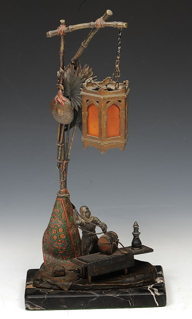 Appraisal: AN AUSTRIAN BRONZE COLD PAINTED LAMP on square cut base