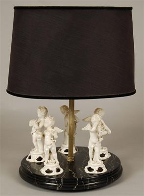 Appraisal: A table lamp the circular faux marble wood base inset