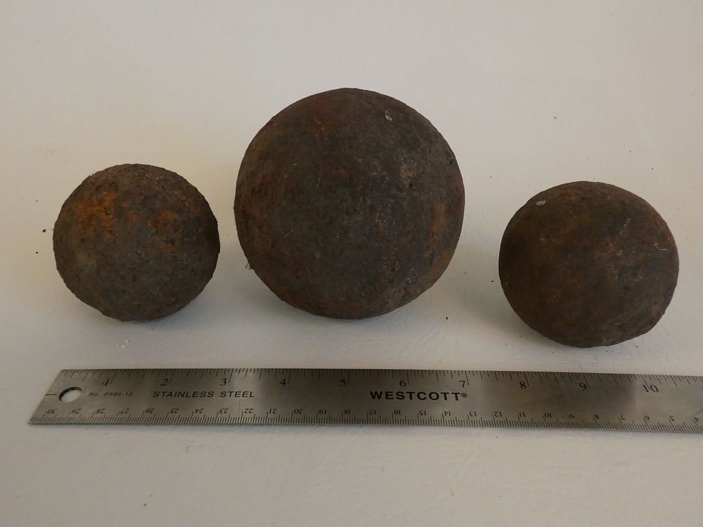 Appraisal: ANTIQUE CANNON BALLS Lot antique iron cannon balls largest inch