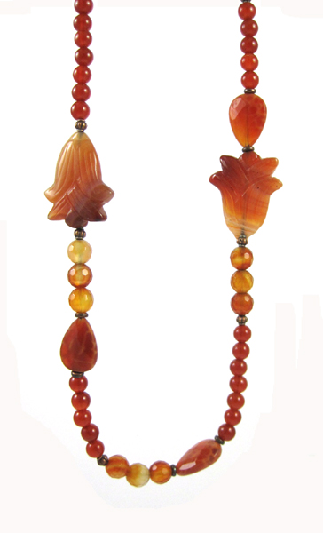 Appraisal: CARNELIAN AGATE BEAD NECKLACE measuring inches in length and strung