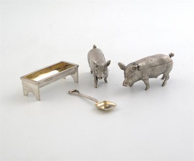 Appraisal: A modern cast novelty pig condiment set comprising a boar