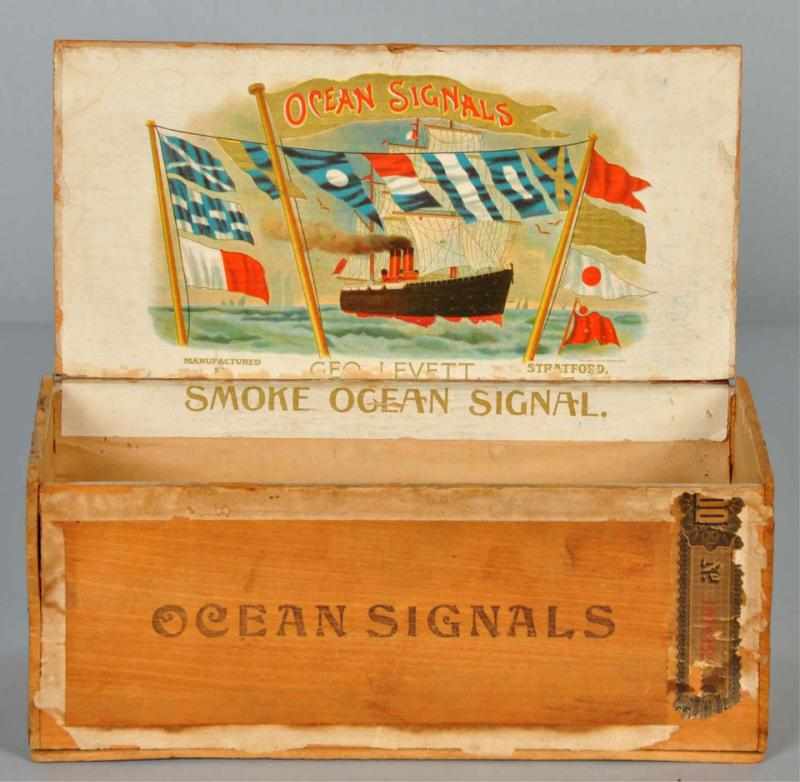 Appraisal: Ocean Signals Cigar Box Description Great example featuring early transportation