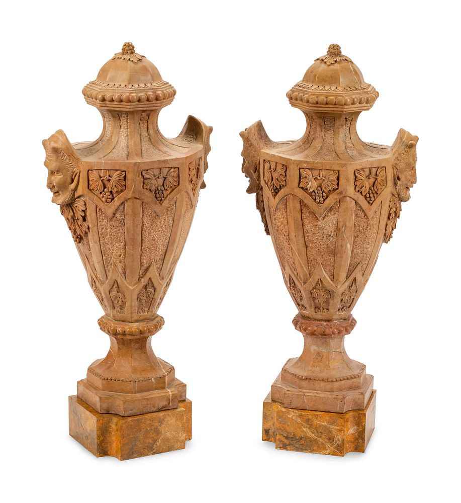 Appraisal: A Pair of Gothic Style Marble Urns with Satyr Handles