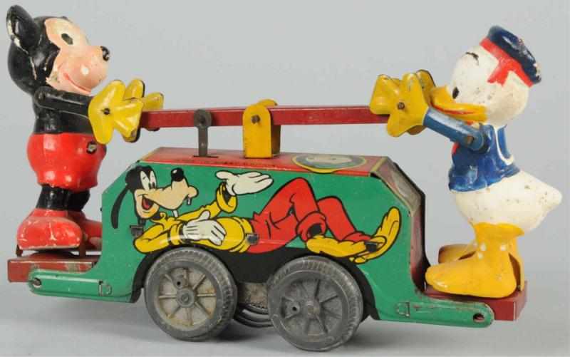 Appraisal: Wells Disney Mickey Donald Clockwork Handcar English Composition figures with