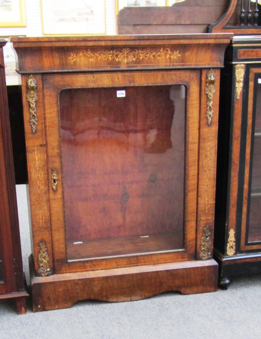 Appraisal: A Victorian gilt metal mounted marquetry inlaid walnut single door