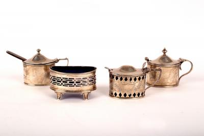 Appraisal: Three silver mustard pots circa with blue glass liners and