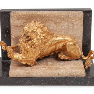 Appraisal: A Gilt Bronze and Limestone Lion Bookend Height x width