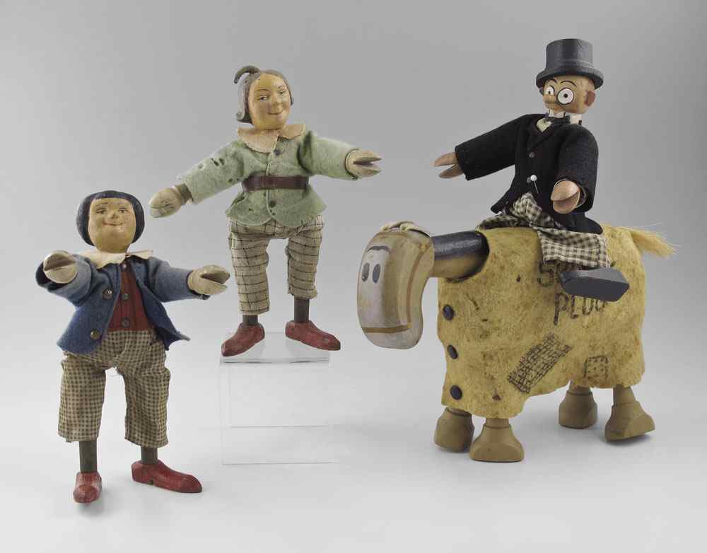 Appraisal: PIECE SCHOENHUT CARTOON FIGURES To include Small head Barney Google