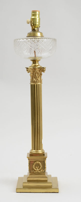 Appraisal: REGENCY STYLE BRASS AND CUT-GLASS COLUMN-FORM OIL LAMP The reeded