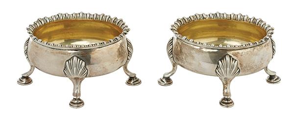 Appraisal: A PAIR OF GEORGE III SILVER SALTS LONDON With gadrooned