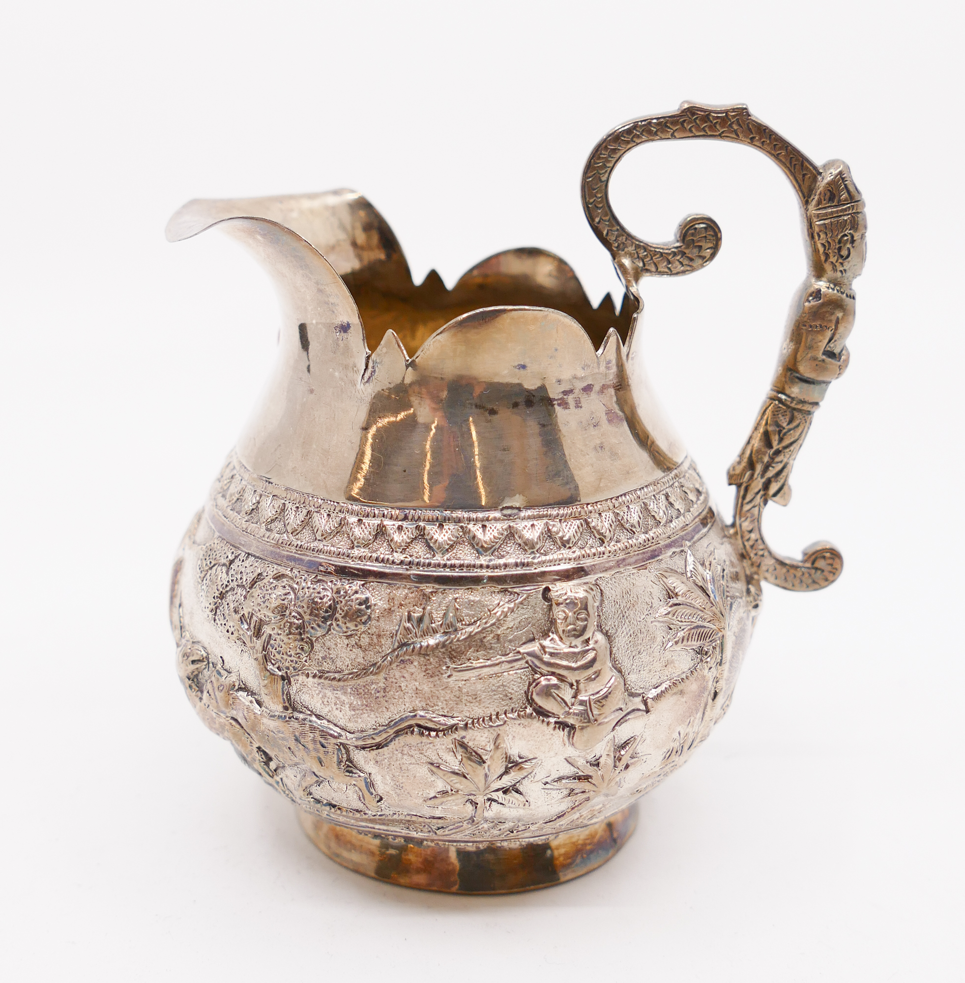 Appraisal: Burmese Silver Repousee Creamer- x x ''- g