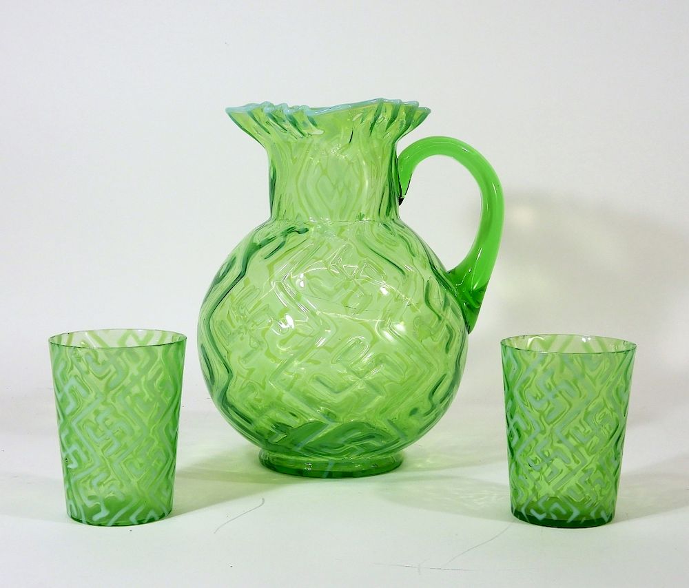 Appraisal: Dugan Opalescent Glass Swastika Pitcher Tumblers Pennsylvania Circa Dugan Glass