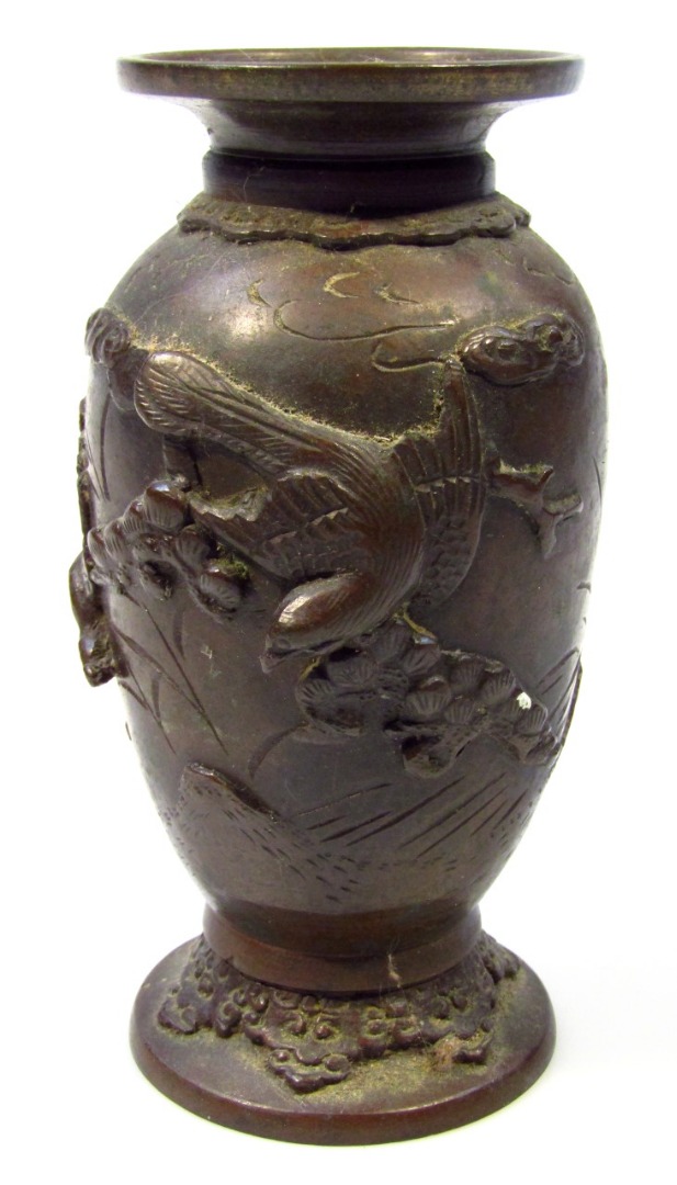 Appraisal: A thC Japanese bronze vase of shaped cylindrical outline raised