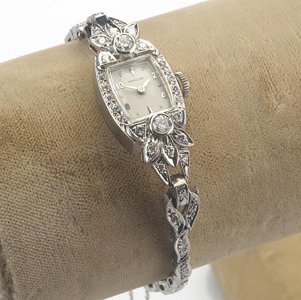 Appraisal: DIAMOND BRACELET WATCH THREE RINGS Hamilton k wg ca jeweled