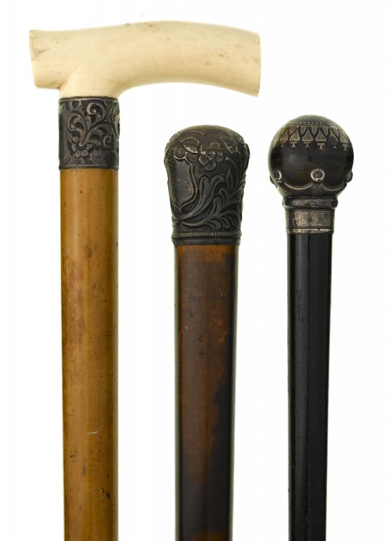 Appraisal: A VICTORIAN SILVER MOUNTED EBONY CANE with silver inlaid horn