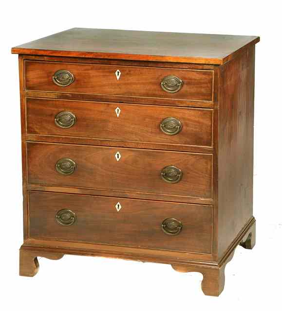 Appraisal: A GEORGE III MAHOGANY STRAIGHT FRONT CHEST of four long