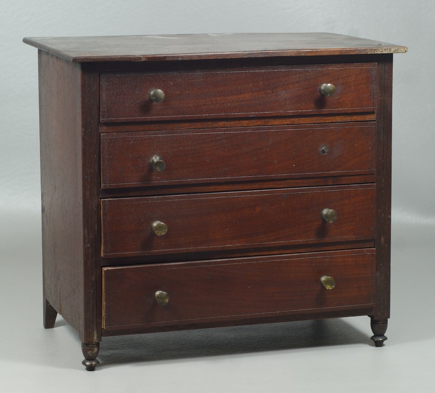 Appraisal: Miniature mahogany Sheraton drawer chest scratch beaded stiles and drawers