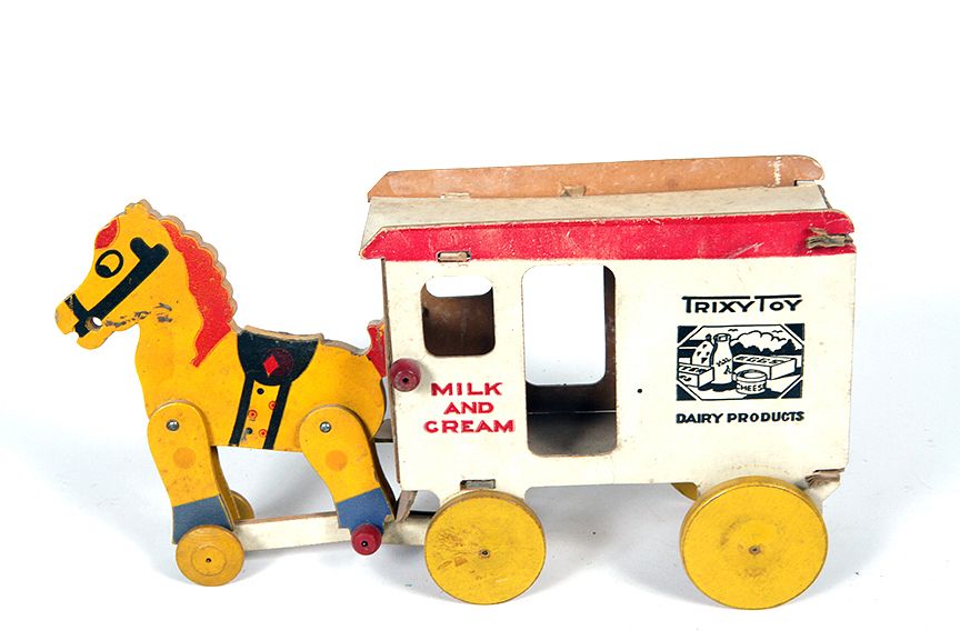 Appraisal: Tricky Toy Milk Wagon A x Trixy toy with wooden