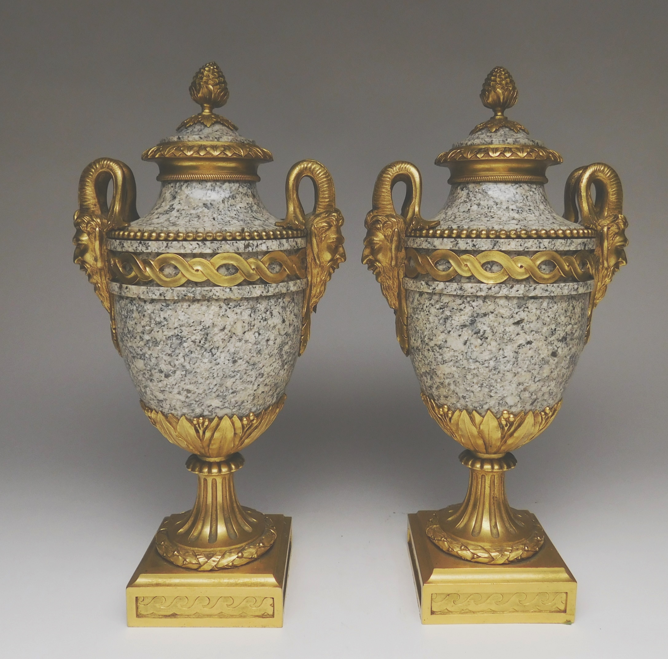 Appraisal: Pair of marble urns with bronze mounts pedestal base with