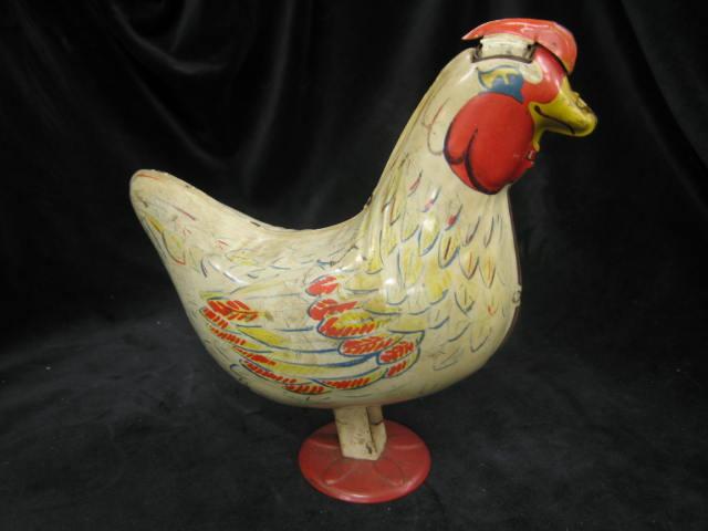 Appraisal: Wyandotte Tin Mechanical Toy Chicken lays glass eggs working