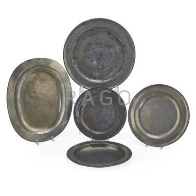 Appraisal: ENGLISH PEWTER Five chargers and trays th th c Oval